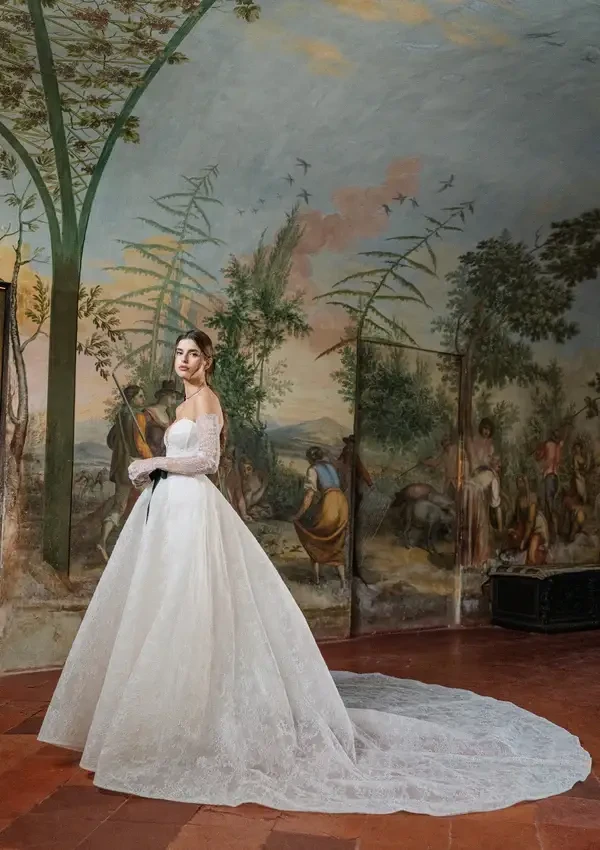 Model wearing a dress by Monique Lhuillier